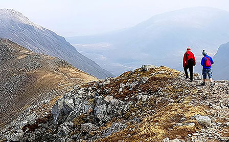 People Hiking the Mountain